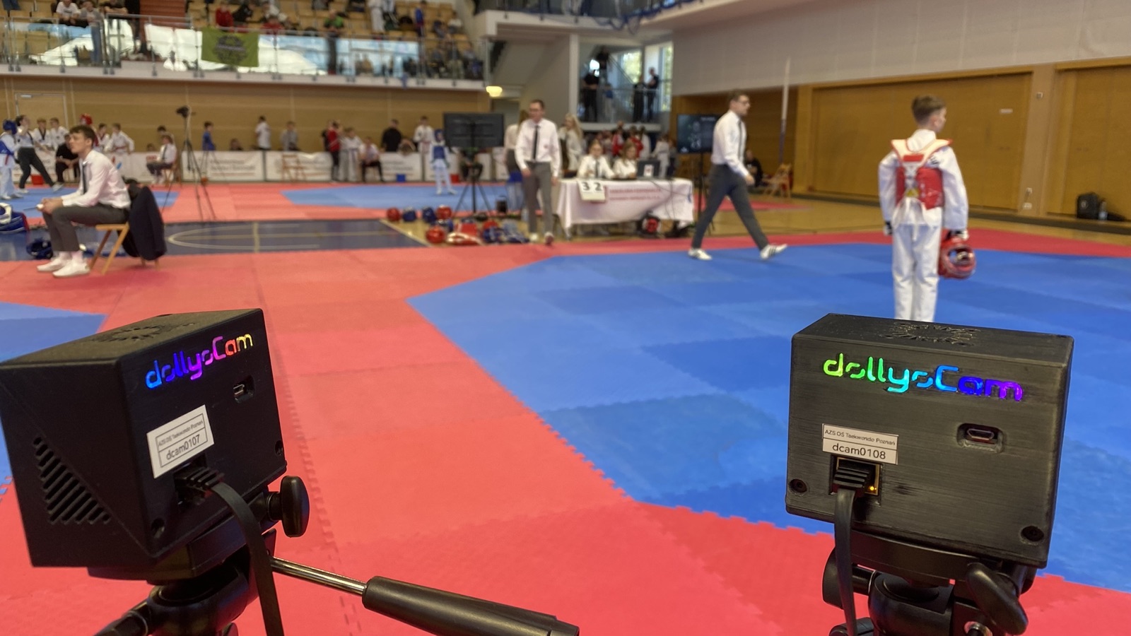 Two dollyoCams covering their courts, wired into the scoring system